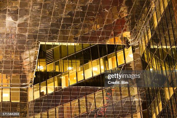 glass roof of an illuminated office building at night - construction of eldorado gold corp s greek gold mine stockfoto's en -beelden