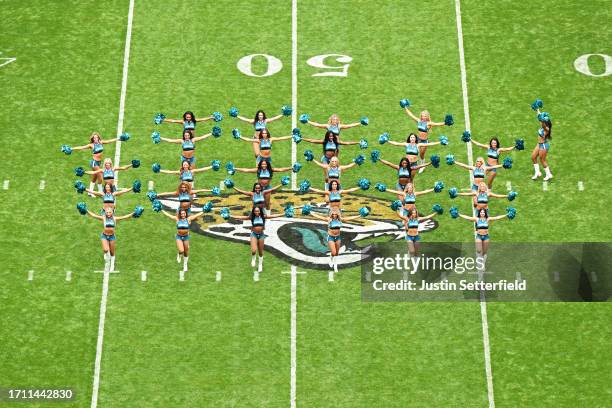 Jacksonville Jaguars cheerleaders are seen on the field prior to the NFL match between Atlanta Falcons and Jacksonville Jaguars at Wembley Stadium on...