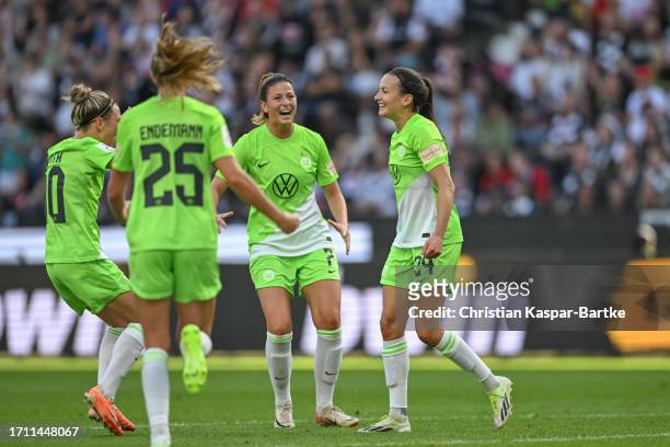 Joelle Wedemeyer of VfL Wolfsburg celebrates after scoring her team`s third goal during the Google Pixel Women's Bundesliga match between Eintracht...