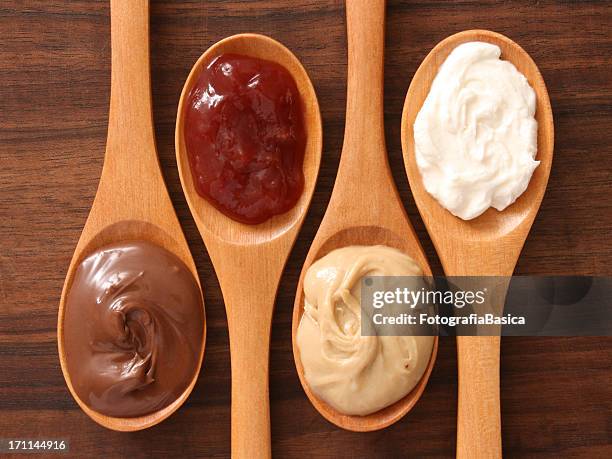 spreads and spoons - wooden spoon stock pictures, royalty-free photos & images