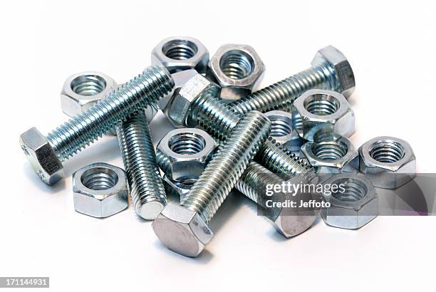 steel nuts and bolts isolated on white - nut fastener stock pictures, royalty-free photos & images