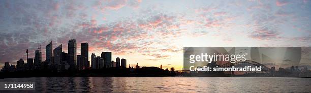 sun sets on sydney - sydney skyline stock pictures, royalty-free photos & images