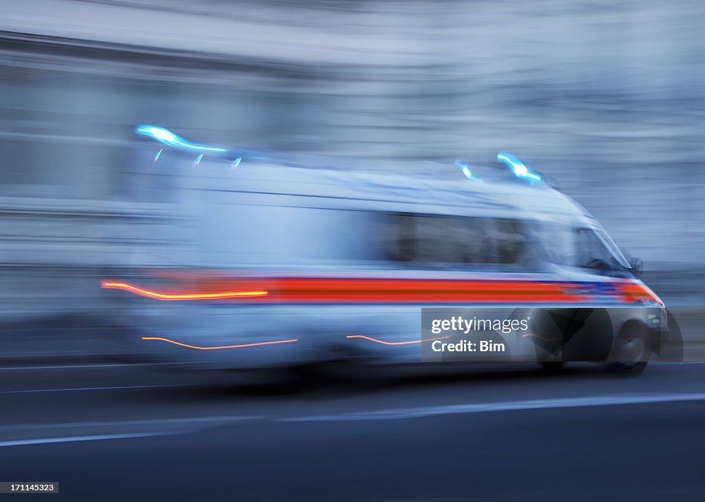 Police Car or Ambulance Speeding, Blurred Motion, London, England
