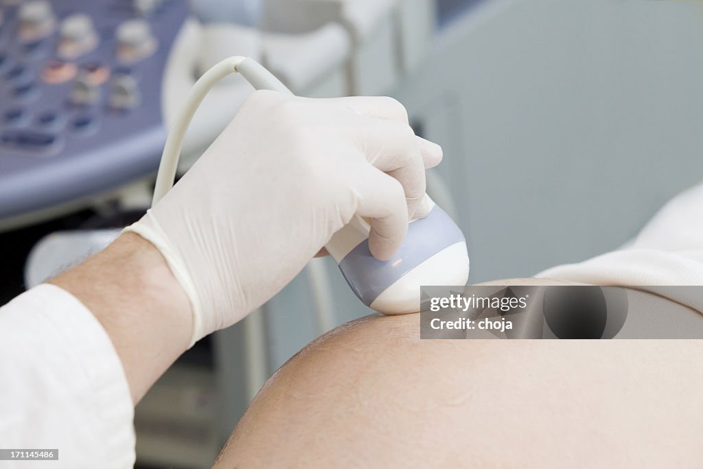 Pregnant women is having an ultrasound exam