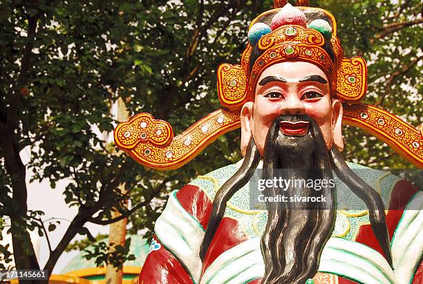 chinese god of wealth - god of wealth stock pictures, royalty-free photos & images