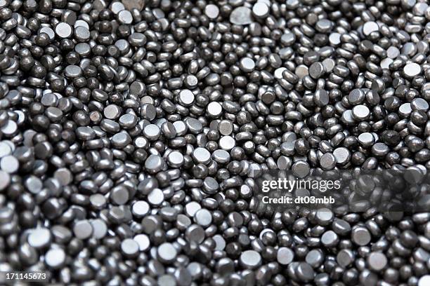 metal chips - iron filing stock pictures, royalty-free photos & images