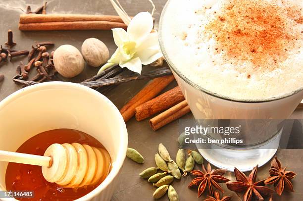 creamy chai latte - clove stock pictures, royalty-free photos & images