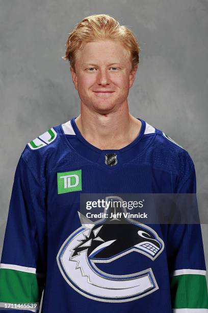 Jack Rathbone of the Vancouver Canucks poses for his official headshot for the 2023-2024 season on September 20, 2023 in Vancouver, British Columbia,...