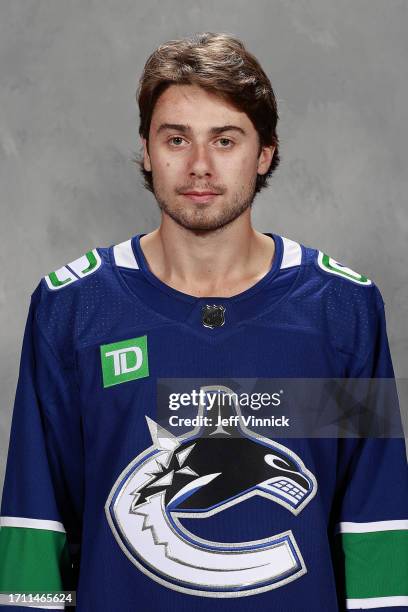 Quinn Hughes of the Vancouver Canucks poses for his official headshot for the 2023-2024 season on September 20, 2023 in Vancouver, British Columbia,...