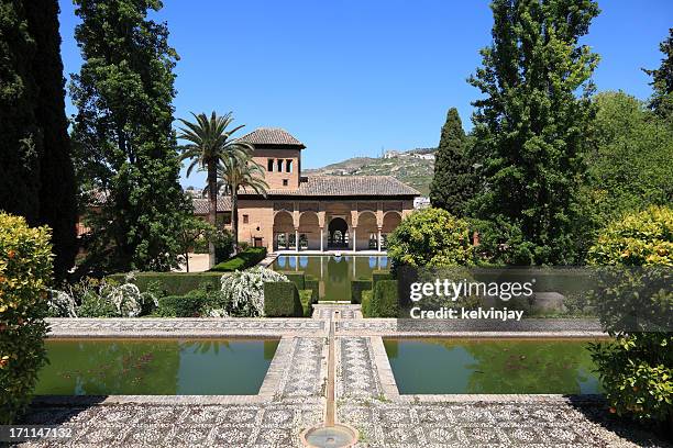 el partal in the alhambra gardens, granada - alhambra gardens stock pictures, royalty-free photos & images