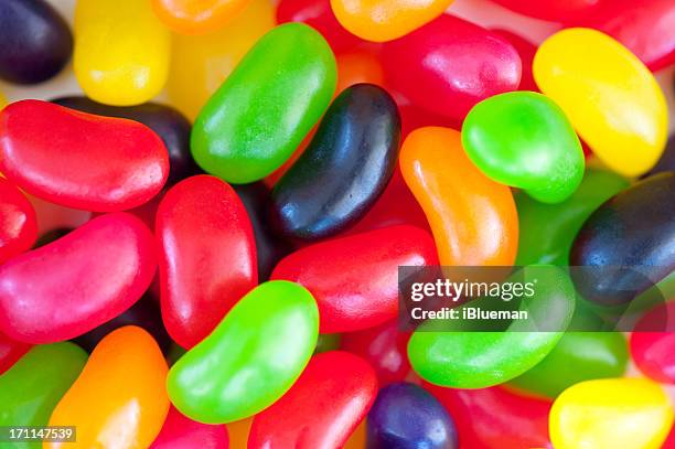 colourful and sweet jelly beans close up - jellybean stock pictures, royalty-free photos & images