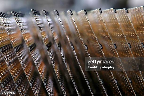 close up of circuit boards on assembly line - moederbord stockfoto's en -beelden
