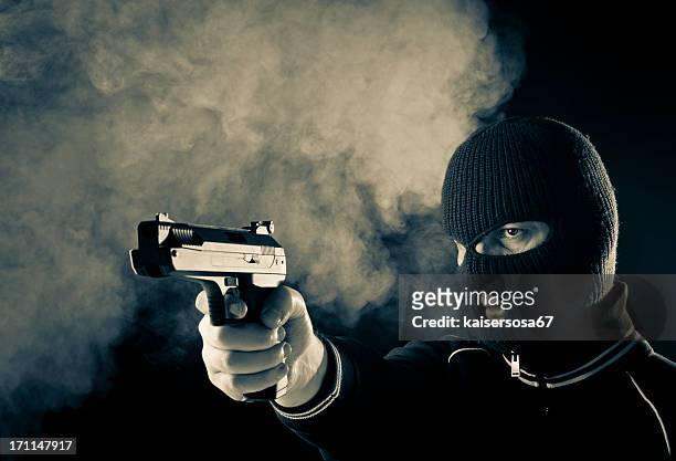 criminal with gun - balaclava gun stock pictures, royalty-free photos & images