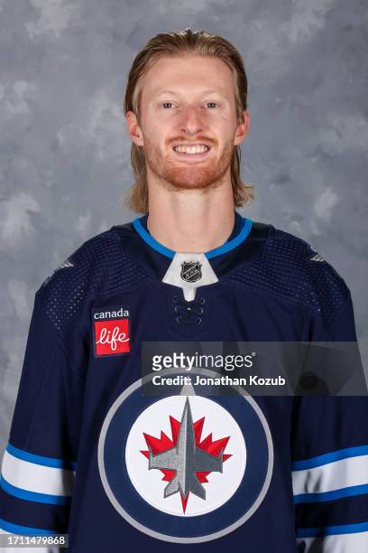Kyle Connor of the Winnipeg Jets poses for his official headshot for the 2023-2024 season on September 20, 2023 at Hockey For All Centre in Winnipeg,...