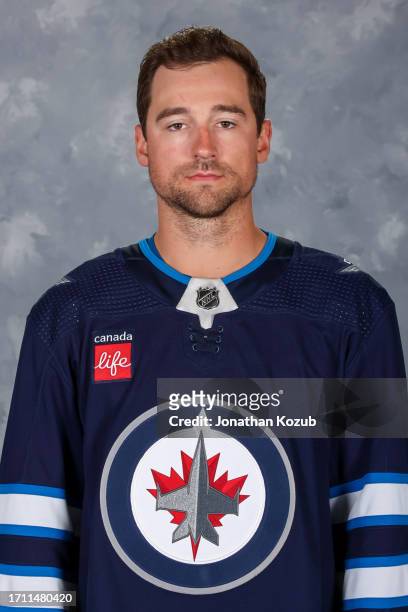 Neal Pionk of the Winnipeg Jets poses for his official headshot for the 2023-2024 season on September 20, 2023 at Hockey For All Centre in Winnipeg,...