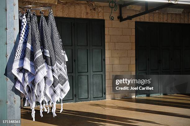 arab palestinian keffiyehs in the west bank - palestinian clothes stock pictures, royalty-free photos & images