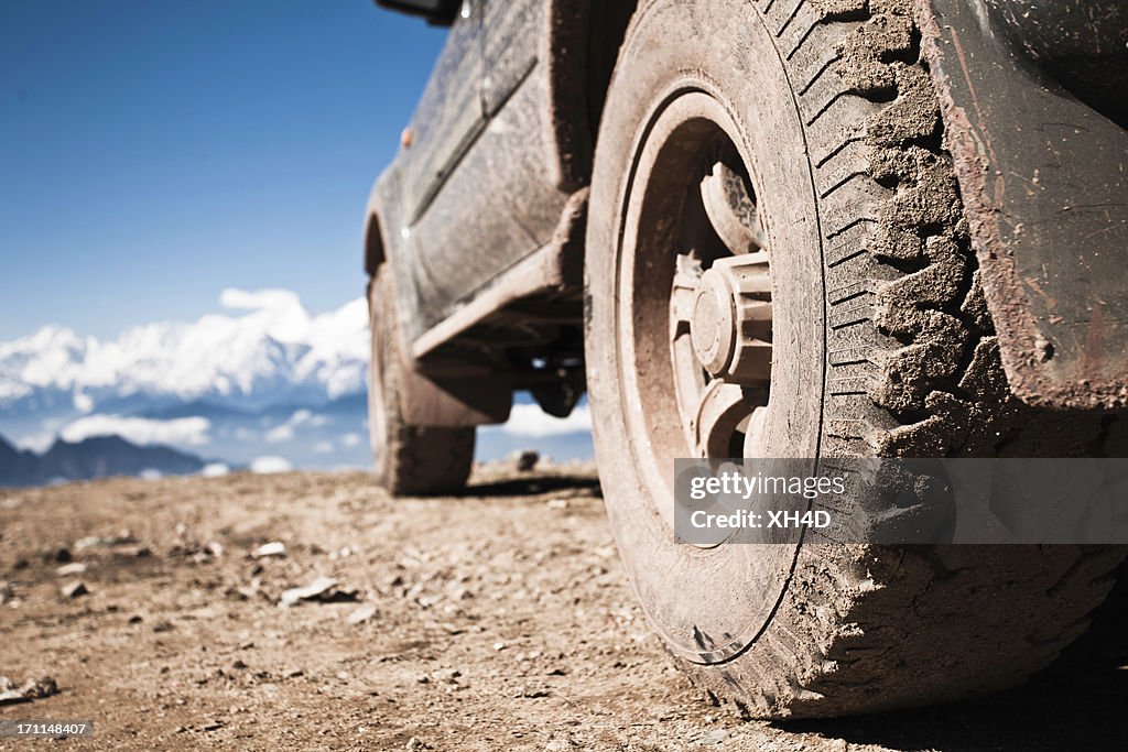 Off-road vehicle on mountain peak