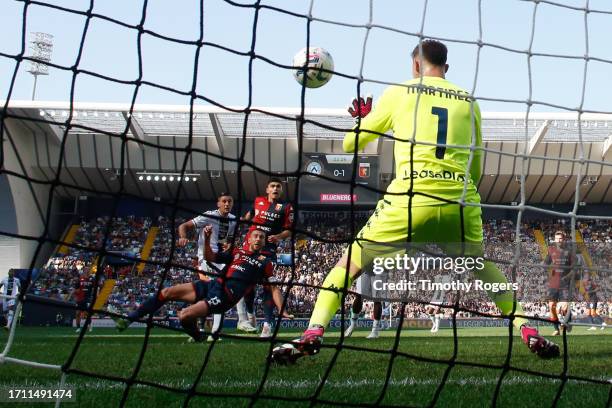 Goalkeeper Josep Martinez of Genoa is beaten by Lorenzo Lucca's strike for Udinese during the Serie A TIM match between Udinese Calcio and Genoa CFC...