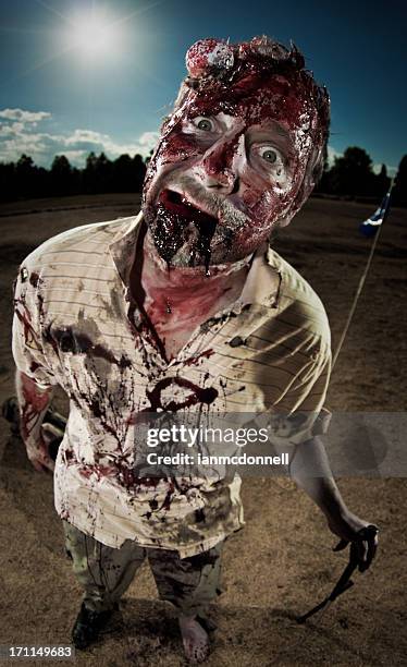 zombie golfer - halloween ball stockfoto's en -beelden