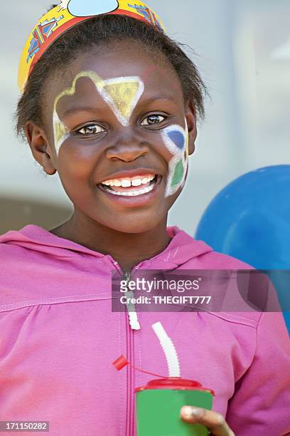african girl at a birthday party - face paint stock pictures, royalty-free photos & images