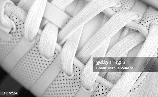 white shoelaces - white shoe lace stock pictures, royalty-free photos & images
