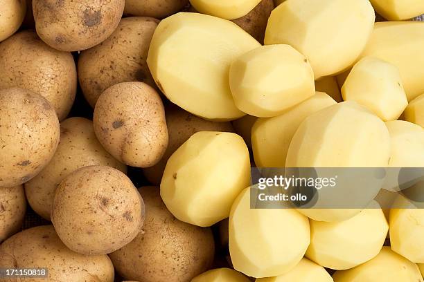 raw potatoes - peeled stock pictures, royalty-free photos & images