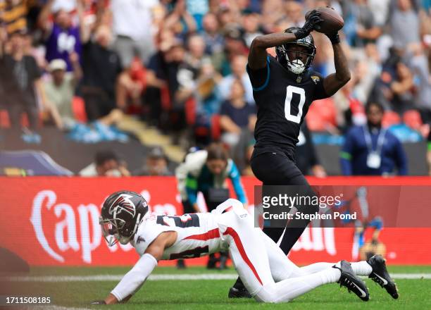 Calvin Ridley of the Jacksonville Jaguars catches a 30 yard touchdown pass during the first quarter during the NFL match between Atlanta Falcons and...