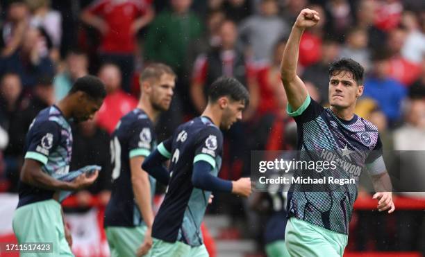 Christian Noergaard of Brentford celebrates after scoring the team's first goal during the Premier League match between Nottingham Forest and...