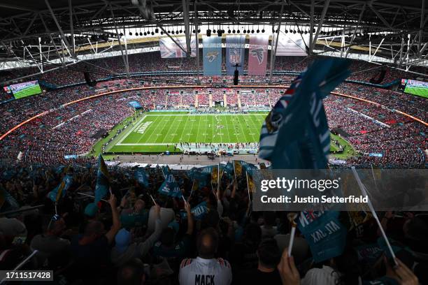 General view inside the stadium as Jacksonville Jaguars fans show their support with flags prior to the NFL match between Atlanta Falcons and...