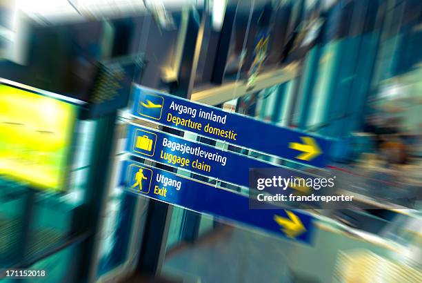 turist information and office signs on central station in oslo - oslo business stock pictures, royalty-free photos & images