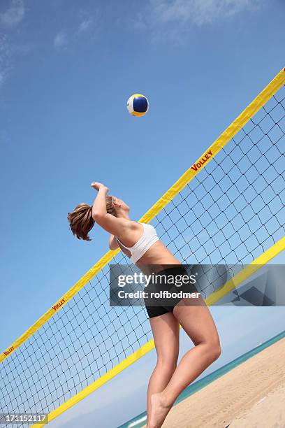 volleyball - girls beach volleyball stock pictures, royalty-free photos & images