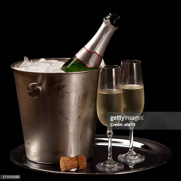 champagne on ice - ice bucket stock pictures, royalty-free photos & images