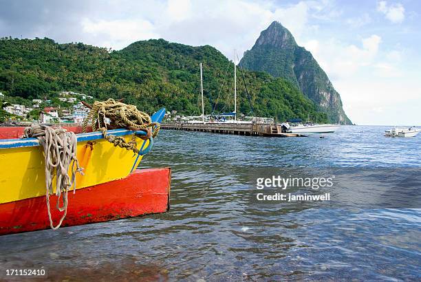 scenic soufriere with pitons and fishing boat - cinder cone volcano stock pictures, royalty-free photos & images