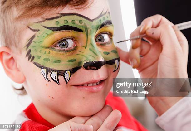 young boy with painted face - face paint kids bildbanksfoton och bilder