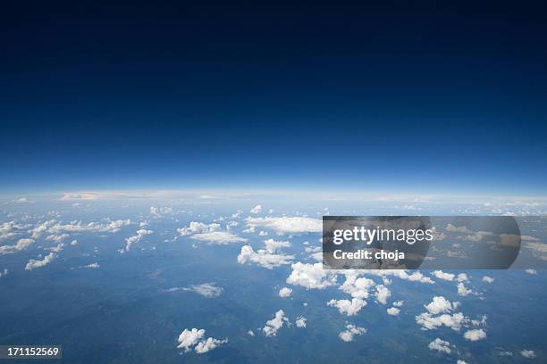 high altitude view of the slight curvature to earth.. - stratosphere stock pictures, royalty-free photos & images