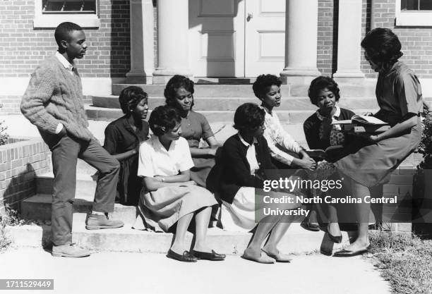 Charles Sutton , Gloria Snipes, Deloris Boone, and Flora Faison . Second row: Shirley Henderson, Natalie Marshall, Nettie Young, and Sandra Wray. Six...