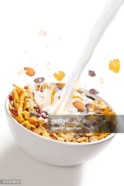 corn flakes - breakfast cereal stock pictures, royalty-free photos & images