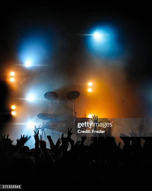 concert crowd in front of drummer - drummer silhouette stock pictures, royalty-free photos & images