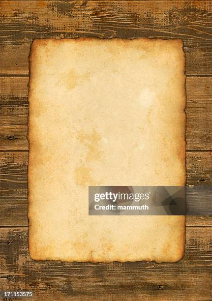 old paper on wooden background - country and western music stockfoto's en -beelden