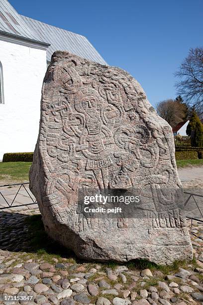 unesco world heritage denmark's birth certificate the jelling runic stone - runes stock pictures, royalty-free photos & images