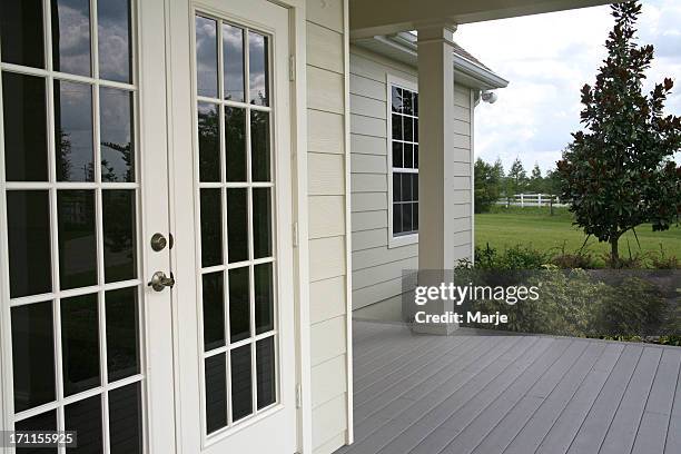 french doors, country home porch - french doors stockfoto's en -beelden