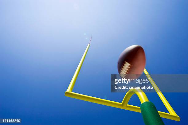 looking up at field goal - american football - american football field stock pictures, royalty-free photos & images