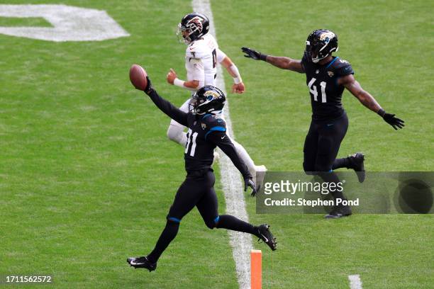 Darious Williams of the Jacksonville Jaguars scores a 61 yard touchdown after an interception thrown by Desmond Ridder of the Atlanta Falcons during...