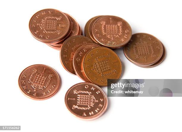 british one penny coins - uk cash stock pictures, royalty-free photos & images