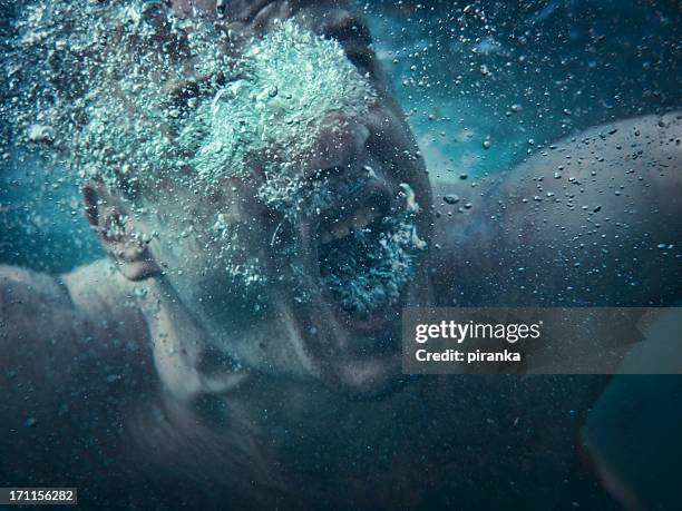 drowning - man face under water stock pictures, royalty-free photos & images