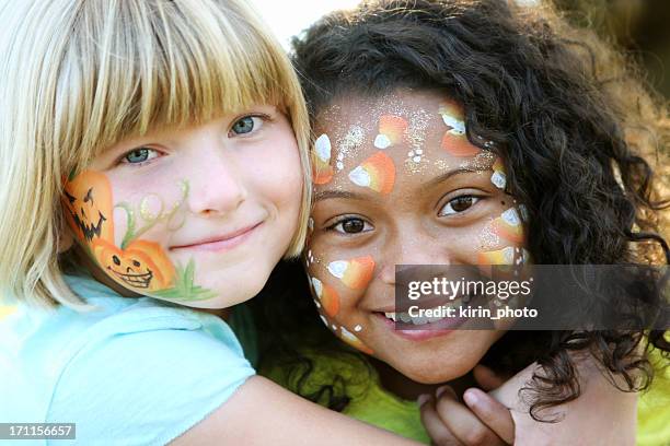 face painted kids - geschminkt gezicht stockfoto's en -beelden