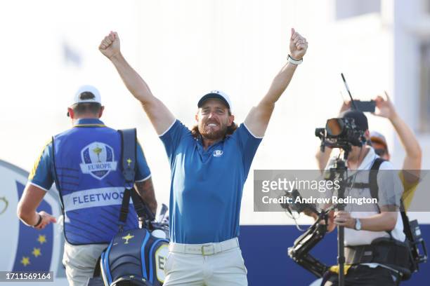 Tommy Fleetwood of Team Europe celebrates on the 17th tee during the Sunday singles matches of the 2023 Ryder Cup at Marco Simone Golf Club on...