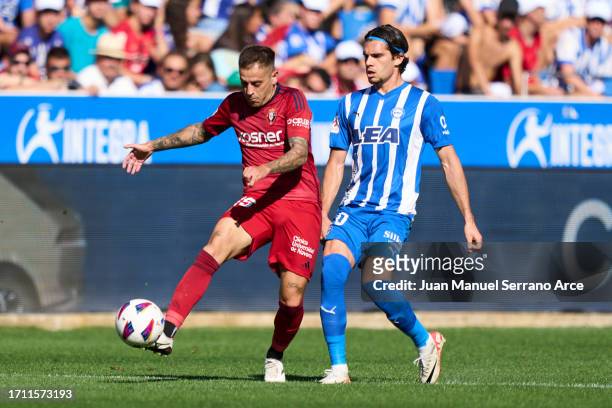 Ianis Hagi of Deportivo Alaves duels for the ball with Ruben Pena of CA Osasuna during the LaLiga EA Sports match between Deportivo Alaves and CA...