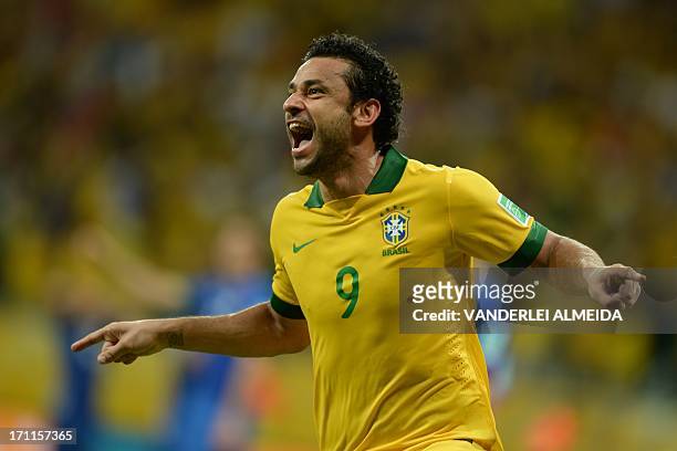 Brazil's forward Fred celebrates after scoring against Italy during their FIFA Confederations Cup Brazil 2013 Group A football match, at the Fonte...