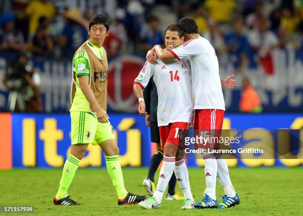 Javier Hernandez and Hector Moreno of Mexico celebrate after defeating Japan by a score of 2-1 during the FIFA Confederations Cup Brazil 2013 Group A...